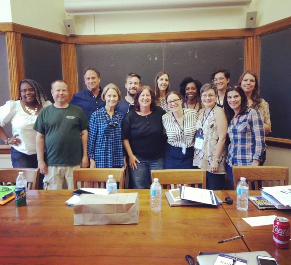 A pink logo for 9 9 u